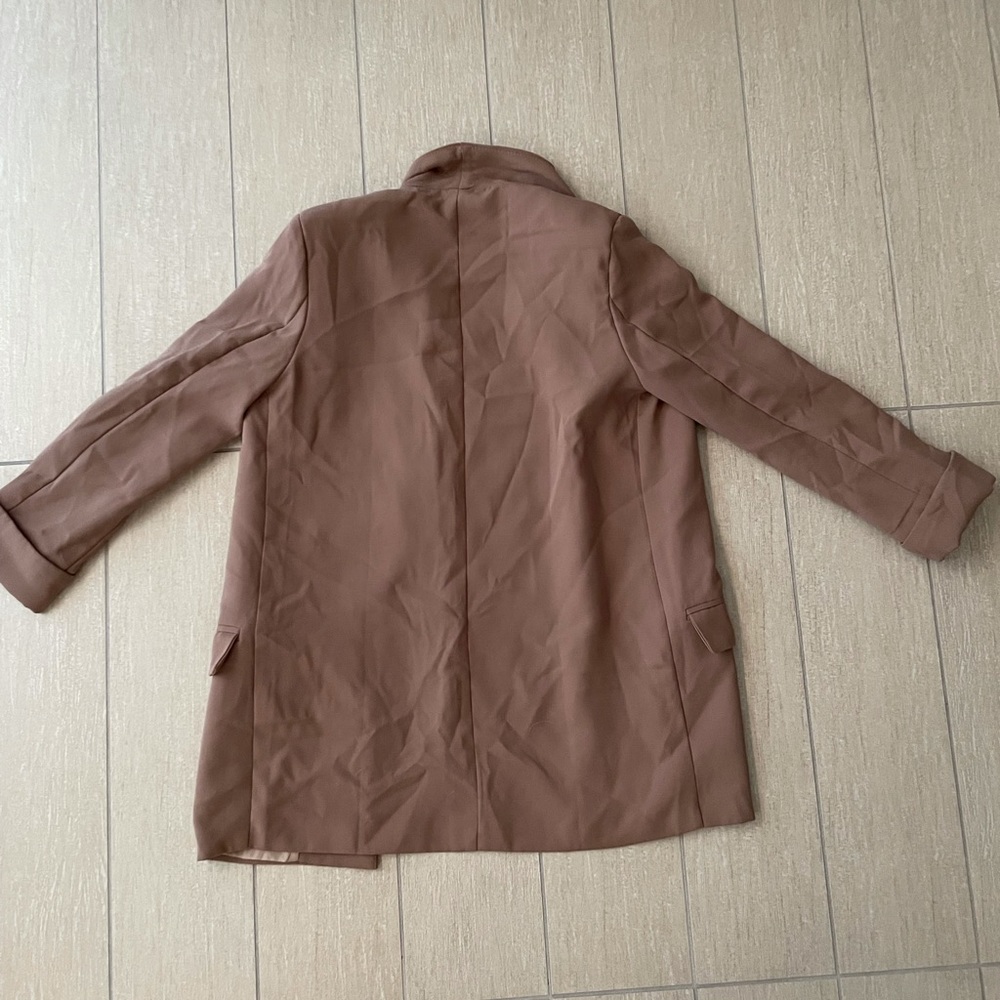 Brown woman’s blazer